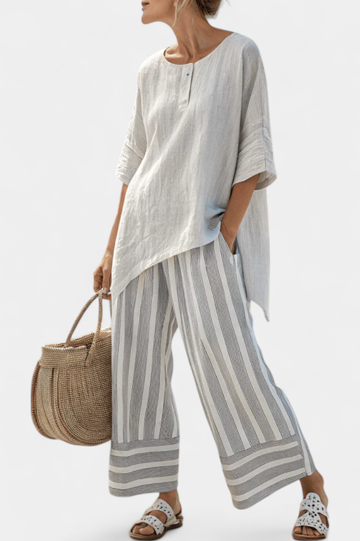 Lada – Stylish Asymmetrical Shirt Paired with Striped Pants